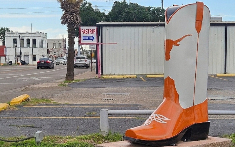 Las Botas de Mercedes — giant orange and white cowboy boot sculpture at Business 83 (2nd Street) and South Texas Avenue in Mercedes, TX