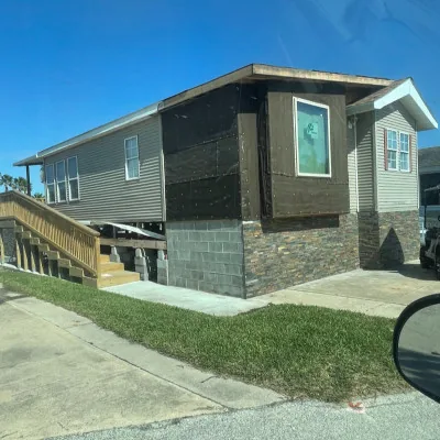 Single-story Rio Grande Valley home leveled by Action House Leveling, with fresh stone skirting and a level porch